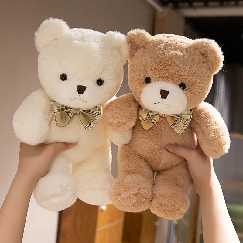 deux doudou enfant blanc et brun
