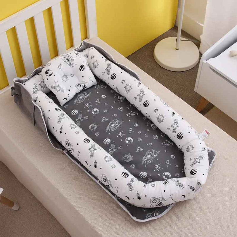 reducteur lit bebe blanc noir