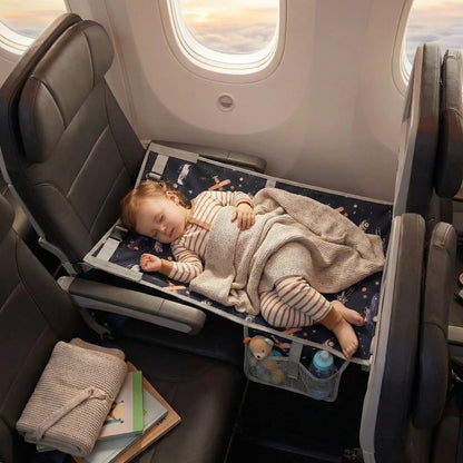 bebe dort durant le vol sur lit bebe pour voyage