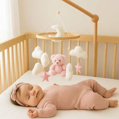 Bébé dort sous mobile bebe 