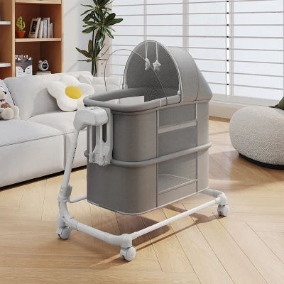 berceau pliable pour bebe gris dans salon