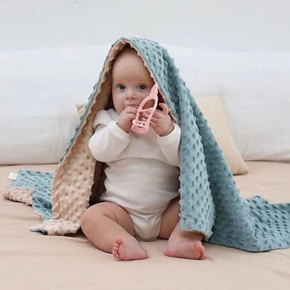 Couverture bébé sur la tête de bébé