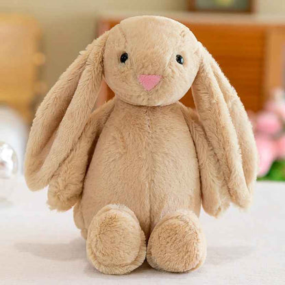 doudou pour bebe assis