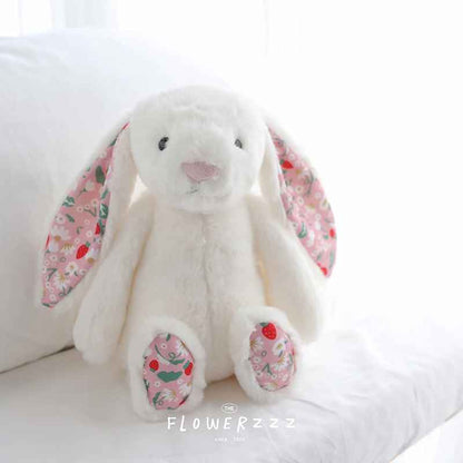 doudou pour bebe blanc assis