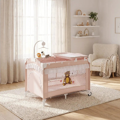 Lit bébé confort avec mobile dessus