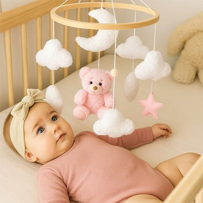 Mobile bebe acroche sur le lit bébé 