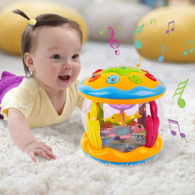 Projecteur veilleuse et bébé sur tapis