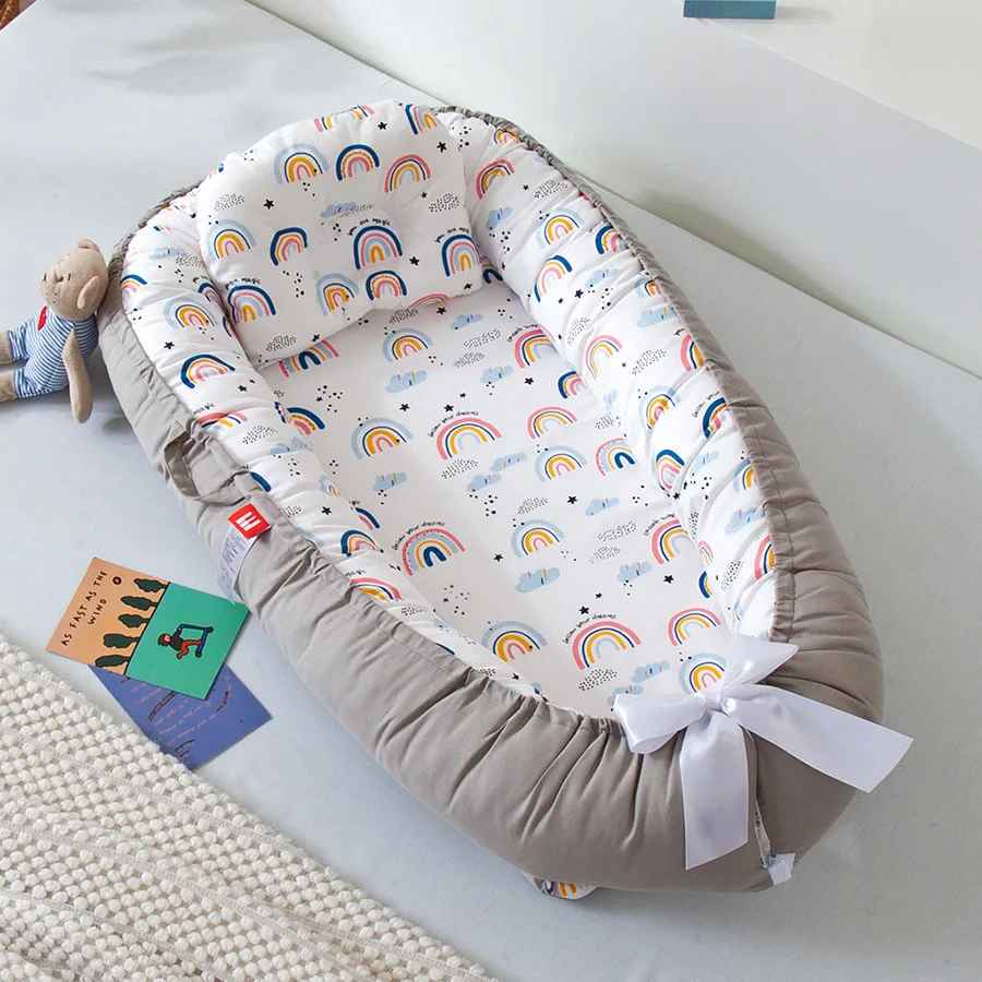 reducteur de lit avec doudou