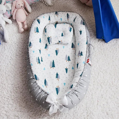 reducteur de lit bebe au dessin arbre de noel