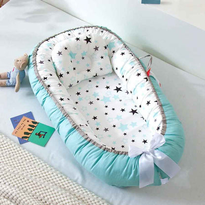reducteur de lit bebe bleu ciel