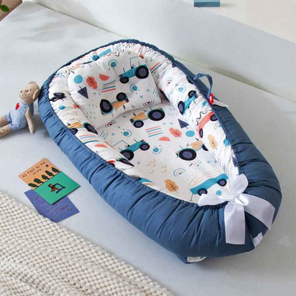 reducteur de lit bebe bleu fonce