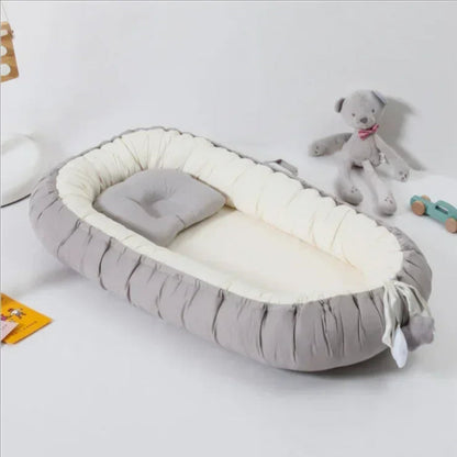 reducteur de lit bebe gris