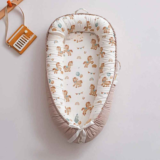 reducteur de lit bebe