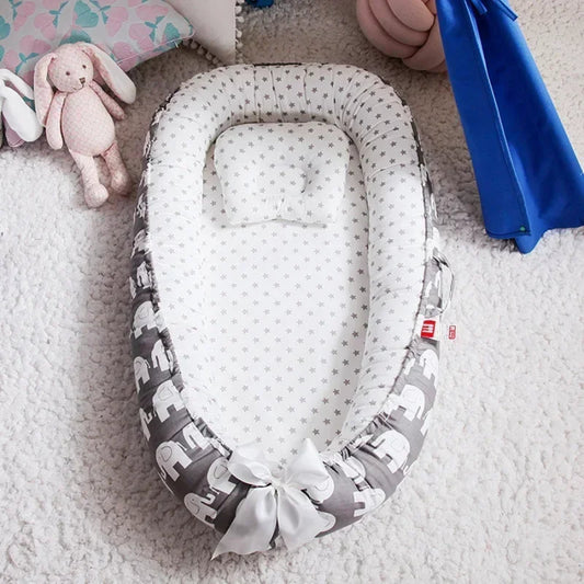 reducteur de lit bebe