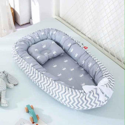 reducteur de lit gris