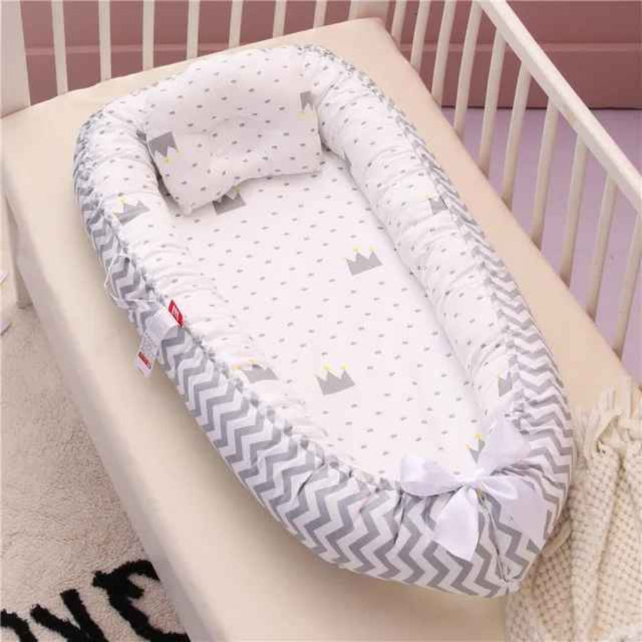 reducteur de lit pour bebe gris