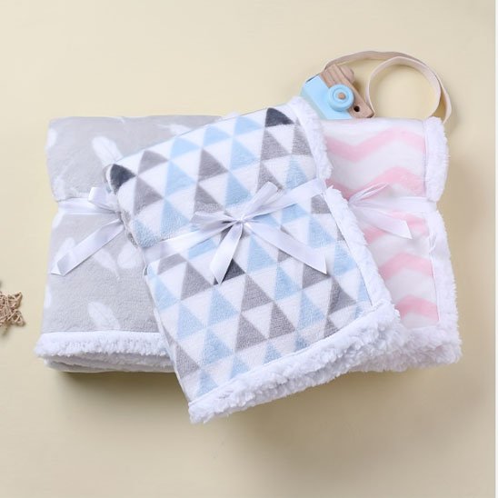 Trois couvertures bébé